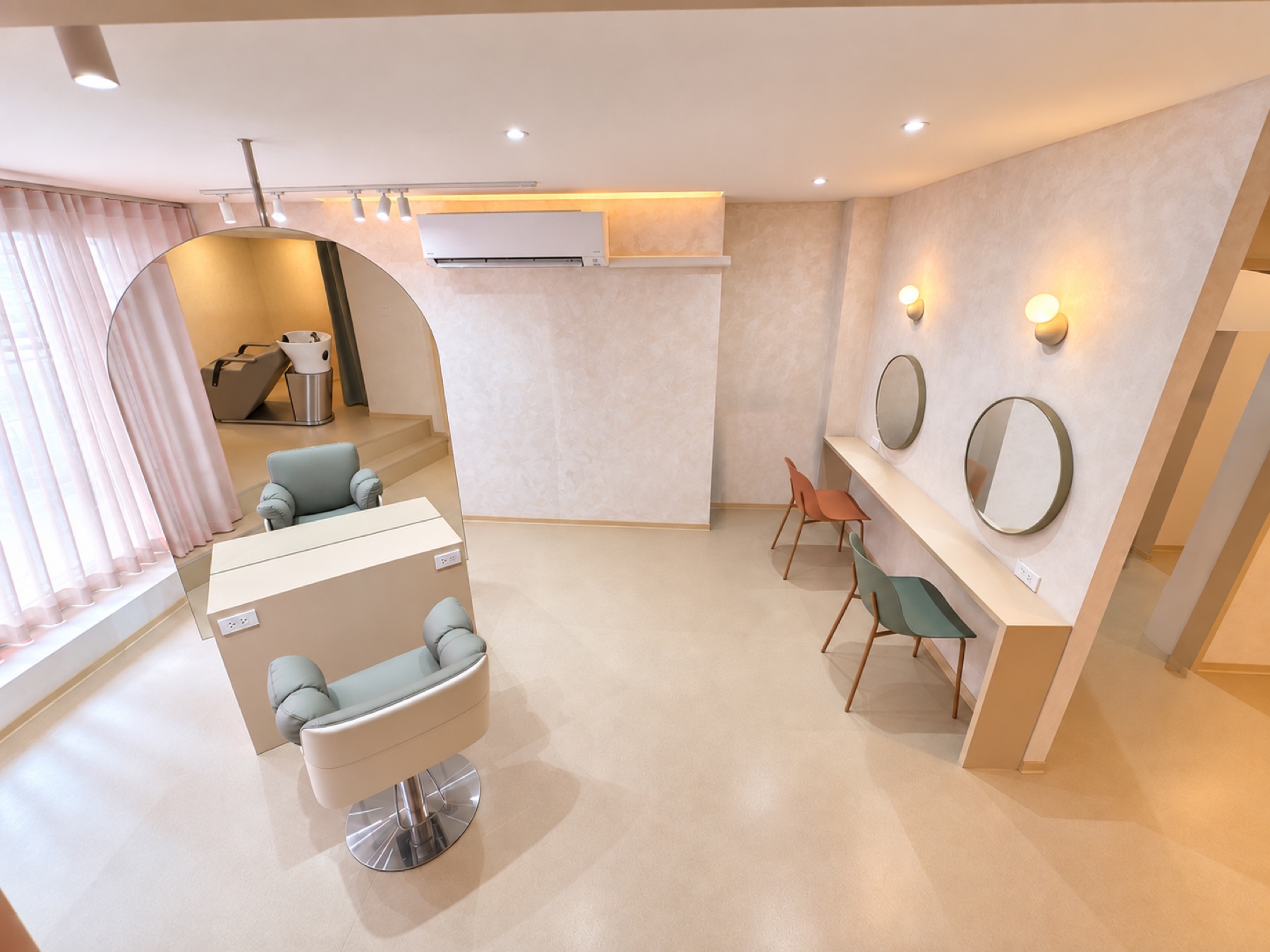 Wide view of the styling and consultation areas at Nn hair salon